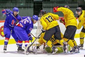 Harry Gulliver battles to get the puck through on the Lithuanian goal. Picture courtesy of Hendrik Soots.