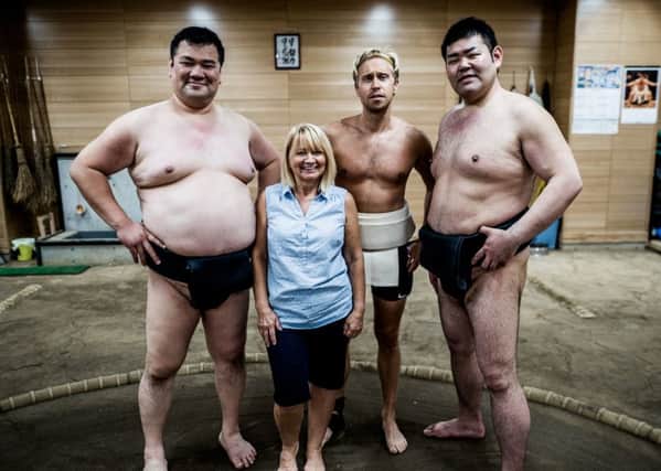 Ninette Howard and Russell Howard travel around the Far East in new show Russell Howard & Mum: Globetrotters. Picture: PA Photo/Comedy Central UK