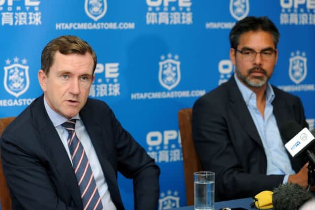 SEARCHING: Huddersfield Town chairman Dean Hoyle, left, with David Wagner after he signed a new deal with Huddersfield in the summer of 2017. 
Picture: Jonathan Gawthorpe