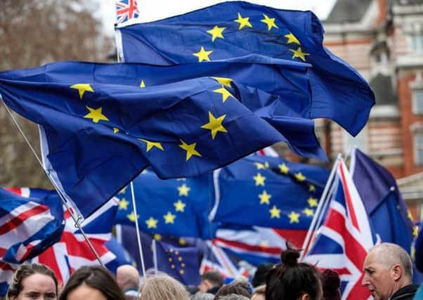 LONDON, ENGLAND - DECEMBER 10: Anti Brexit protesters demonstrate with EU flags outside the Houses of Parliament, Westminster on December 10, 2018 in London, England. The Government are believed to have delayed the Meaningful Vote on Theresa May's Brexit deal, due to take place tomorrow, after hope that it would win the support of MPs faded. (Photo by Jack Taylor/Getty Images)