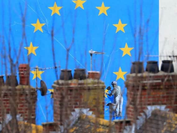 A view of the Brexit-inspired mural by artist Banksy in Dover, Kent, as MPs are preparing to vote on whether to back Prime Minister Theresa May's deal for leaving the European Union. PRESS ASSOCIATION Photo.