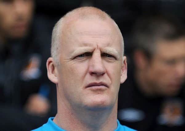 Hull City's then temporary football management consultant Iain Dowie pictured at Wigan in May 2010 (Picture: Nigel French/ PA Wire).