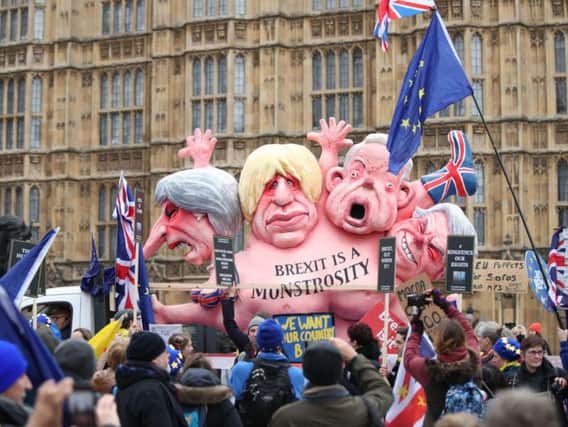 Brexit campaigners gather outside Parliament