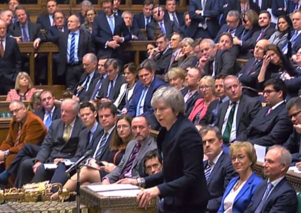 Theresa May addresses Parliament at the end of the Brexit debate.