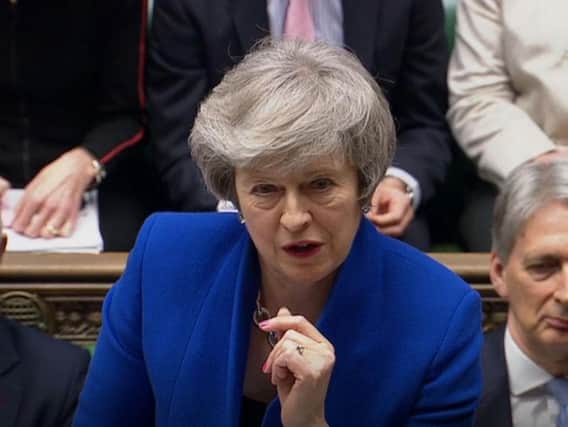 Theresa May took questions from MP in the Commons