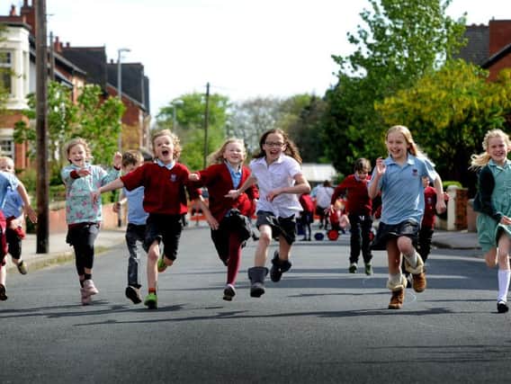 Youngsters enjoying the freedom of their street closure  in Roundhay in May 2015.