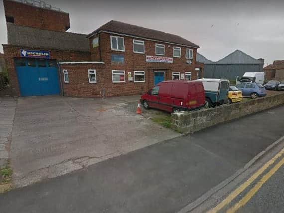 Firefighters remain at Northallerton Tyre and Battery Centre. Picture: Google