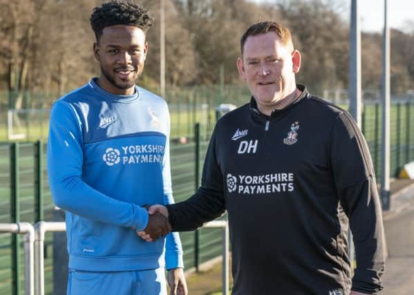 Bradford City manager David Hopkin greets new signing Jermaine Anderson (Picture: Bradford City).