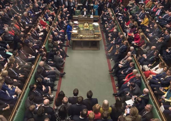 Theresa May addresses MPs at the end of Wednesday's no confidence vote which the Government survived.