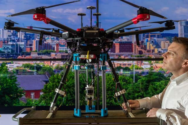 Professor Rob Richardson, from The School of Mechanical Engineering, at University of Leeds, along with his team are pioneering the use of robotic drone technology to repair potholes in the future as part of a Government-funded project called 'Self Repairing Cities'. Picture: James Hardisty.
