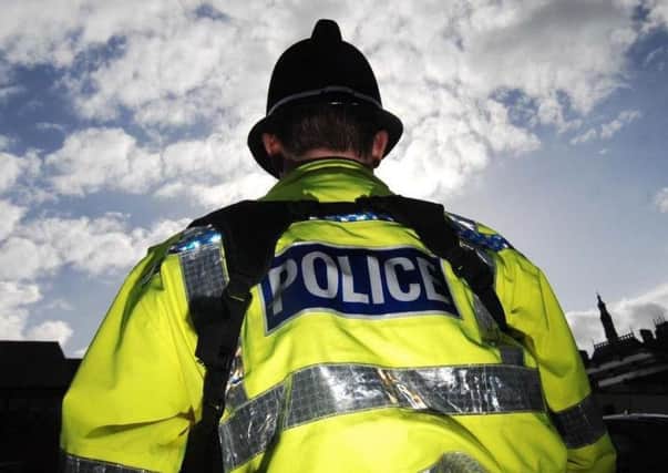 A man has been arrested on suspicion of driving offences and assaulting a police officer.