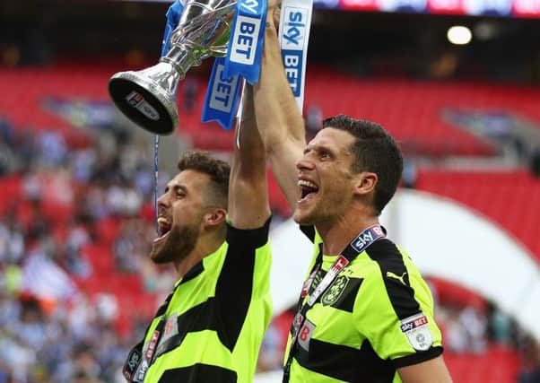 Huddersfield Towns Tommy Smith and Mark Hudson celebrate their Championship play-off win at Wembley in 2017 (Picture: Ian Walton/Getty Images).