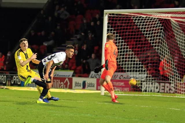 Tyler Smith scores against Burton Albion. Picture: Marie Caley.