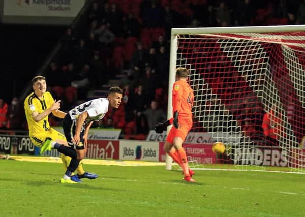 Tyler Smith scores against Burton Albion. Picture: Marie Caley.