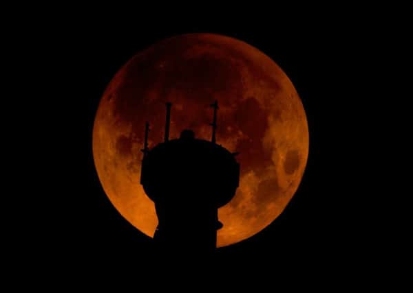 SEPTEMBER 2015: A super blood moon above Emley Moor Mast.