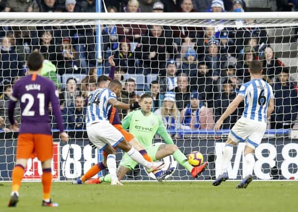 Huddersfield Towns Steve Mounie is unable to convert a late chance against Manchester City (Picture: Martin Rickett/PA Wire).