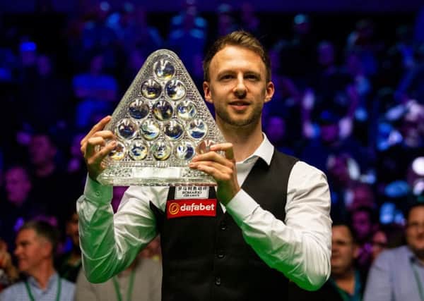 Judd Trump holds the Paul Hunter after winning the Dafabet Masters at Alexandra Palace (Picture: Steven Paston/PA Wire).