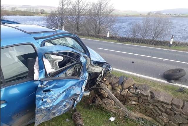 A Renault Clio containing a father and daughter ended up colliding with a drystone wall