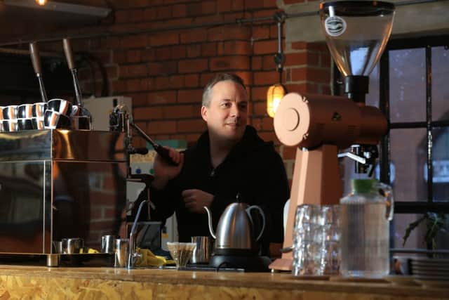 The Cutlery Works in Sheffield. The former cutlery works is now a indoor food market with multiple restaurants and bars. Pictured is Lee Newell from Foundry Coffee Roasters. Picture: Chris Etchells