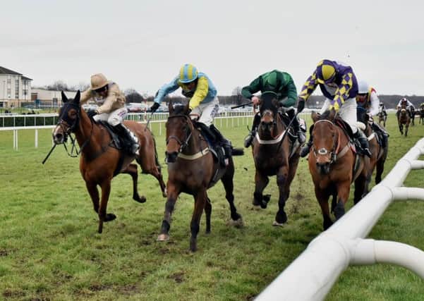 Wakanda, second left, wins the 2018 Sky Bet Chase at Doncaster with Henry Brooke on board.