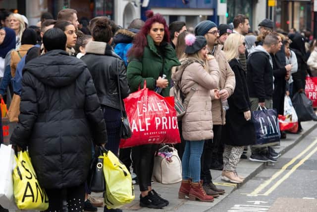 Bargain-hunters during the New Year sales, but how can high streets become more sustainable?