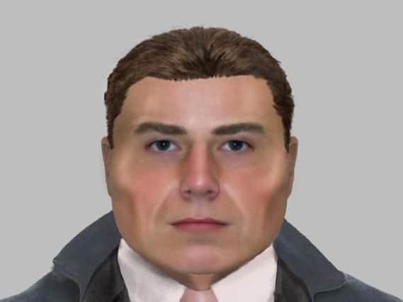 An E-fit of the man who called at the couple's address pretending to be a police officer