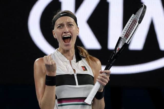 Petra Kvitova of the Czech Republic celebrates after defeating Australia's Ashleigh Barty. Picture: AP/Kin Cheung