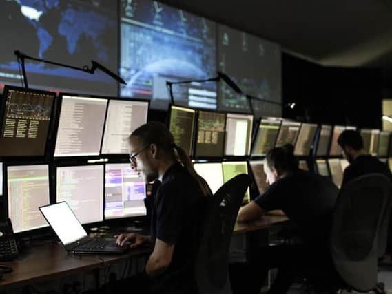 A cyber security research analyst at the ECSC Security Operations Centre 
in Bradford