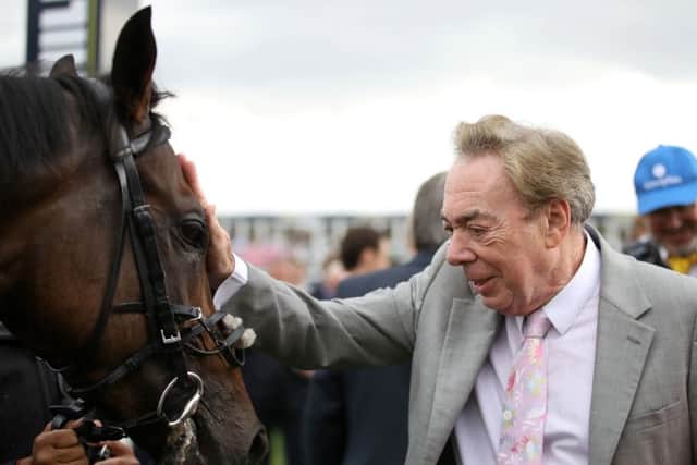 Too Darn Hot with owner Andrew Lloyd Webber after the Champagne Stakes at Doncaster.