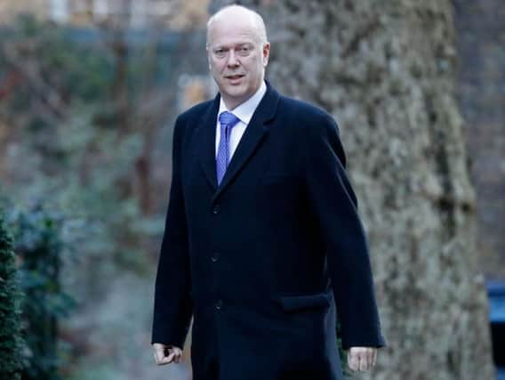 Chris Grayling arrives for a Cabinet meeting at Downing Street: AFP