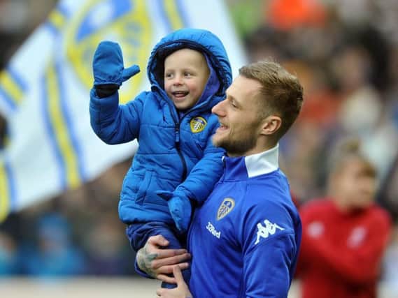 Toby Nye with Leeds United captain Liam Cooper