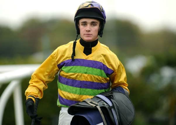 Jockey Tommy Dowson partners Lady Buttons for the first time today.
