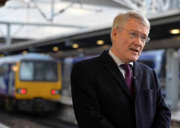 Rail Minister Andrew Jones says season-ticket holders are not entitled to seats.