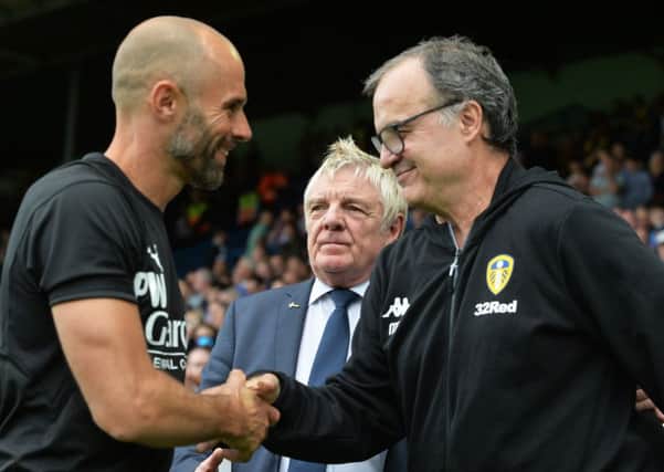 WE MEET AGAIN: Paul Warne, left and Marcelo Bielsa, skae hands at Elland Road earlier this season and meet again today in South Yorkshire. Picture: Bruce Rollinson