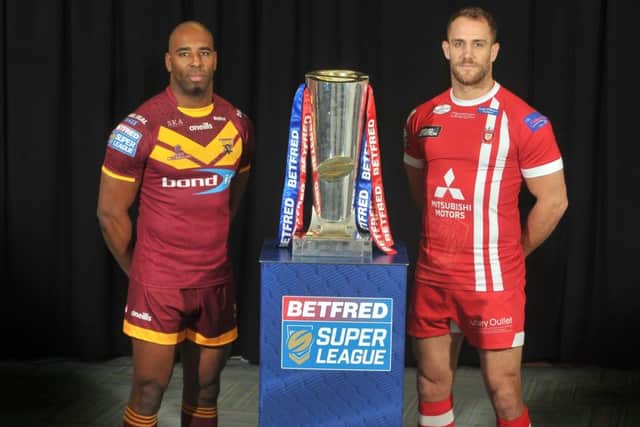 In charge: Michael Lawrence, Huddersfield Giants captain, with Lee Mossop, his Salford Red Devils opposite number.