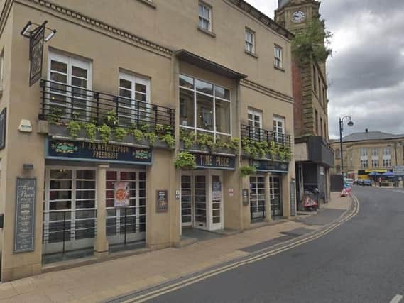 A car crashed into the Time Piece pub in Dewsbury. Pic: Google.