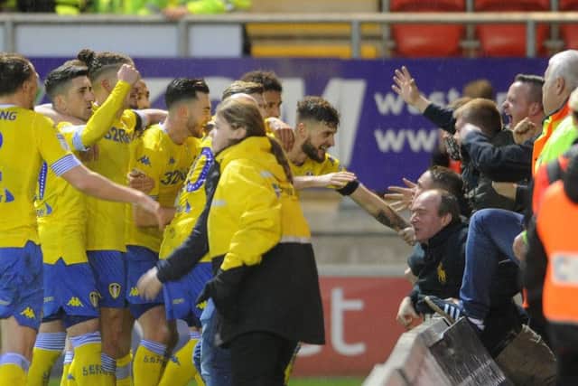 Mateusz Klich celebrates the winning goal with the fans. Picture by Simon Hulme
