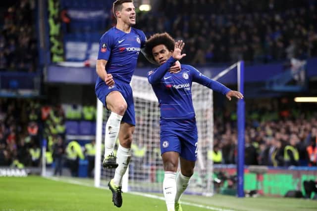 Chelsea's Willian (right) celebrates scoring his side's first goal of the game from the penalty spot with Cesar Azpilicueta. Picture : Nick Potts/PA