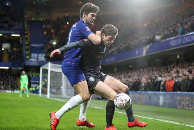 Sheffield Wednesday's Adam Reach comes under pressure from Chelsea's Marcos Alonso at Stamford Bridge. Picture: Nick Potts/PA