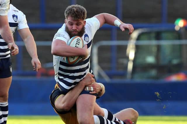 NOT THIS TIME: Carnegie's hooker Joe Buckle finds his path blocked. Picture: Andrew Varley.