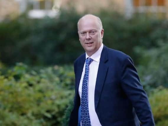 Transport Secretary Chris Grayling arrives to attend the weekly meeting of the Cabinet in Downing Street.