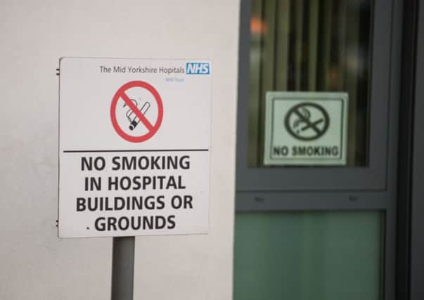 Batley and Spen MP Tracy Brabin wants the law changed to ban smoking on all hospital grounds.