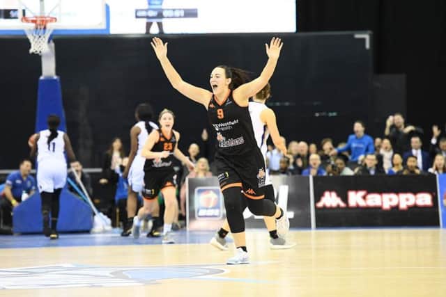 Helen Naylor celebrates after scoring the winning three-pointer (Picture: Mansoor Ahmed).
