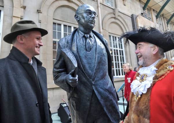 Sculptor Martin Jennings, left, shares a joke with the Lord Mayor of Hull, Coun David Gemmell, after he had unveiled the statue of poet Philip Larkin in Hull Paragon Interchange.