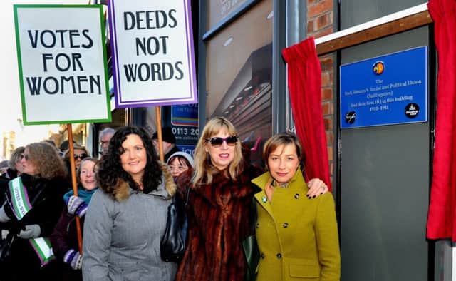 Juliet Forster of York Theatre Royal, Prof Krista Cowman  historical advisor, and Bridget Foreman,  writer of 'Everything is Possible', unveil a plaque on Coney Street in York