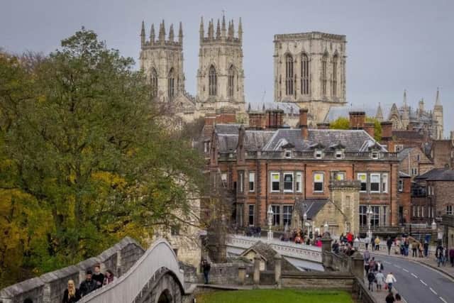 Attractions such as York Minster and the City Walls help attract 6.9m visitors to York annually. Picture by Marisa Cashill.