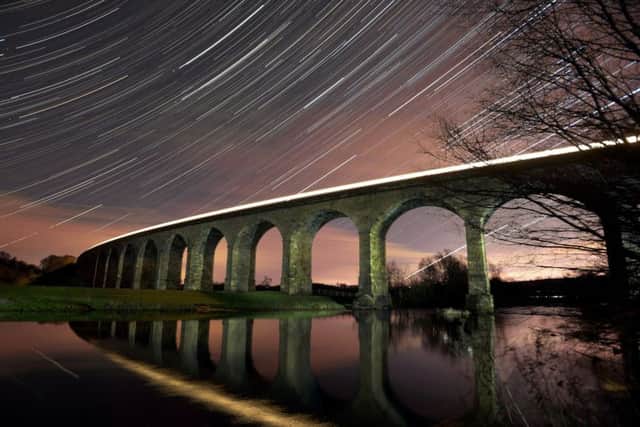 Star Trails over Arthington Viaduct in Whafedale as a train passes.