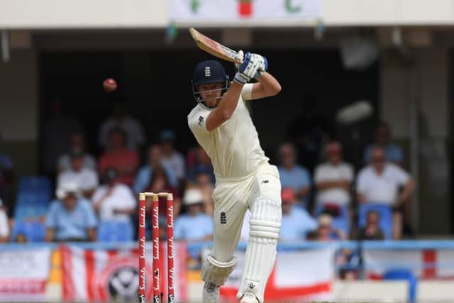 TOP MAN: England's Jonny Bairstow drives one through the covers in his innings of 52 on the first day of the second Test in Antigua. Picture: Shaun Botterill/Getty Images.