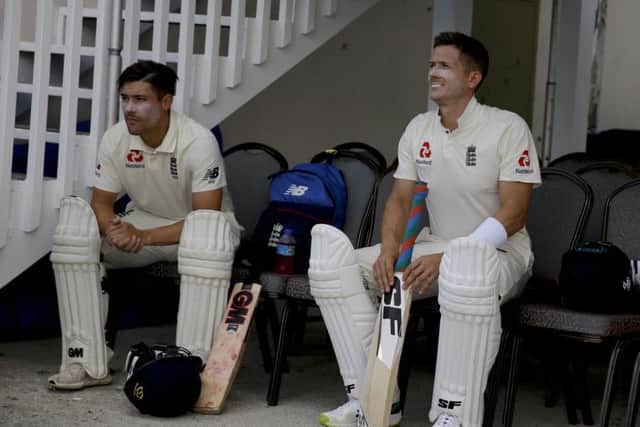English batsmen Rory Burns, left, and Joe Denly prior to the start of day one in Antigua. Picture: AP/Ricardo Mazalan