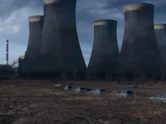 This panoramic shot of a convoy of Land Rovers approaching Eggborough power station appears in the Hobbs & Shaw trailer